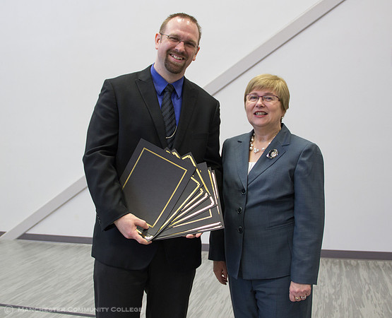 Award recipient Adam Moy and MCC President Susan Huard