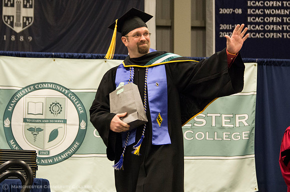 Business Communications graduate Adam Moy receives the President's Award