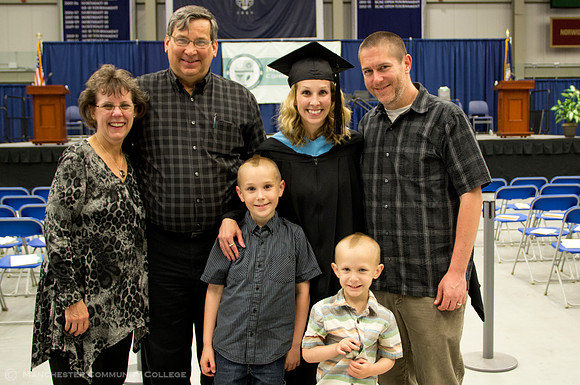 Commencement speaker Kendra Tisbert and her family.